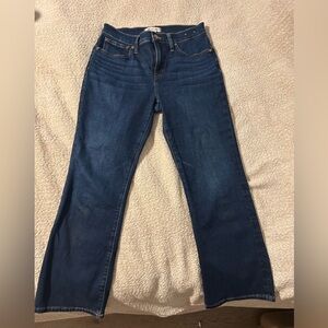 Dark denim stretchy mid rise jeans
